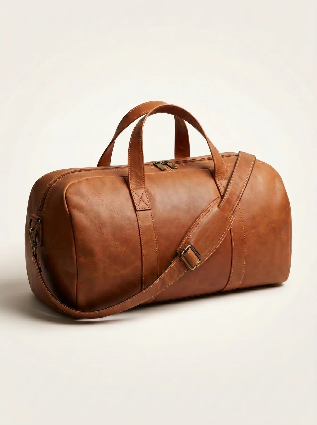 MORAES Leather Travel Duffle — side view with shoulder strap
